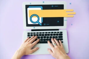 hand coming out of laptop